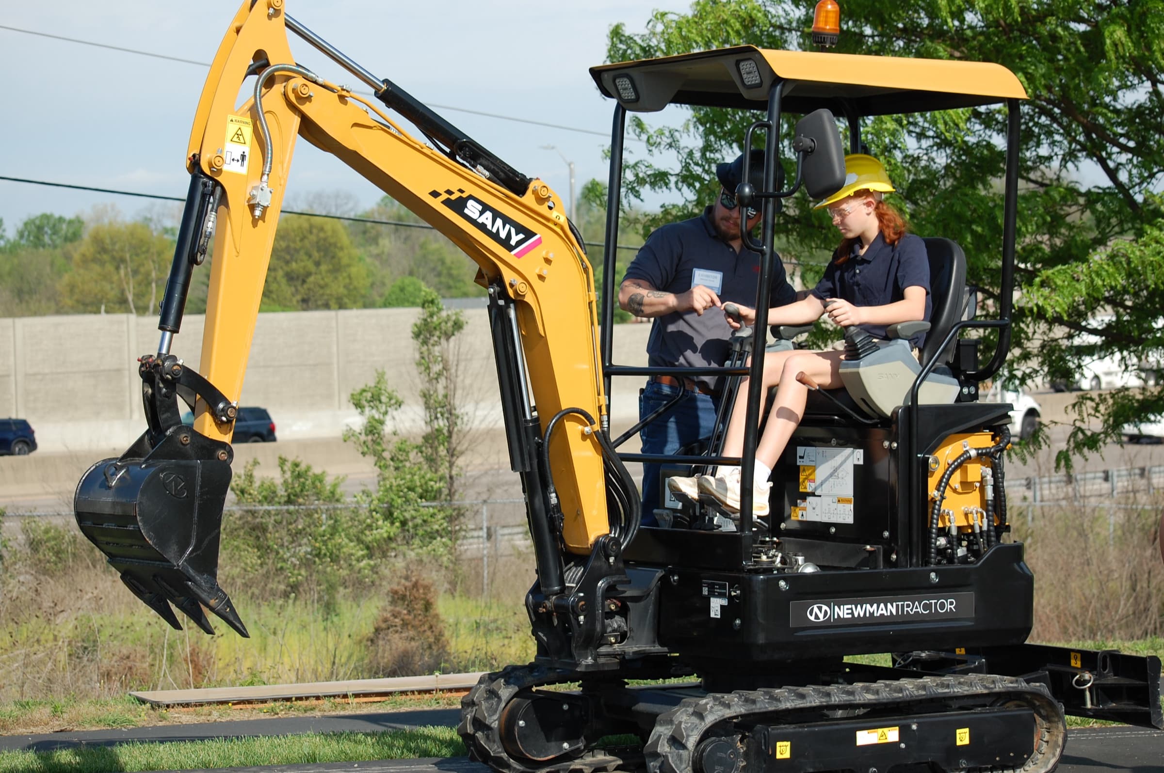 A skilled worker operates equipment on a Northern Kentucky job site